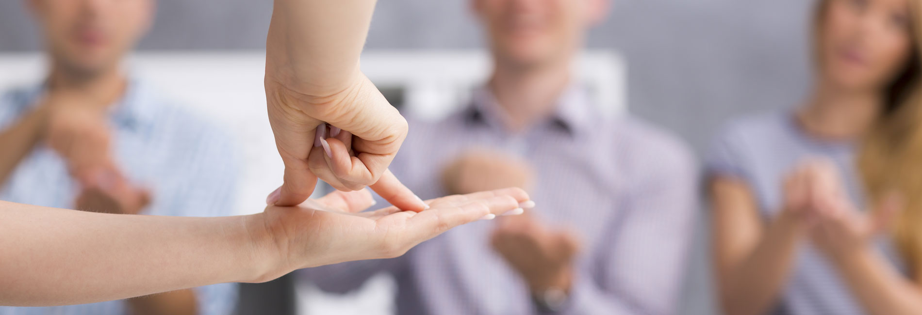 Lady Showing the Word Flat Using Sign Language